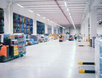 warehouse-industrial-building-interior-with-people-forklifts-handling-goods-storage-area